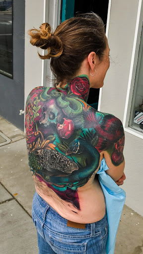 Explore spine tattoo ideas for women, creative tattoo ideas in Hanford, available at Moth Art & Tattoo Collective