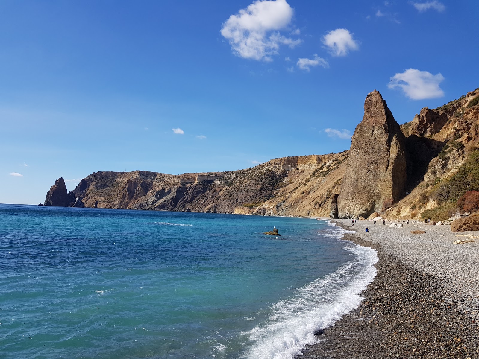 Foto de Praia Jasper com pedras cinzentas superfície