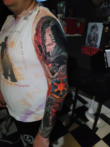 Explore motorbike tattoo ideas, creative tattoo ideas in Columbia, available at Black Widow Tattoo