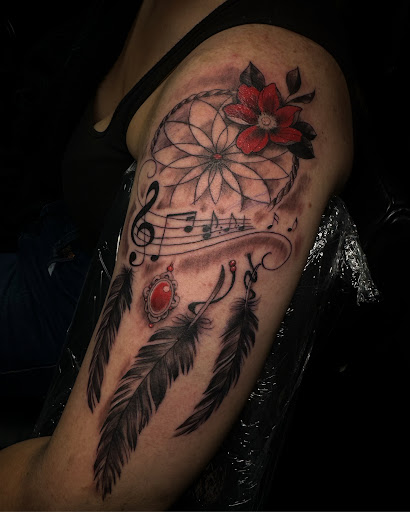 Explore half arm sleeve tattoo ideas, creative tattoo ideas in Lawrenceburg, available at Good Luck Marys Tattoo co.