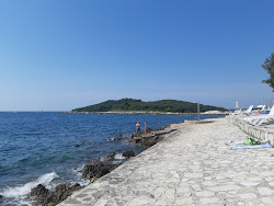 Porto Sole beach'in fotoğrafı küçük koy ile birlikte