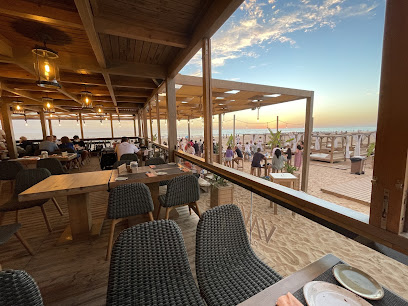 Restaurante VAVÁ Playa La Barrosa - Urbanización Novo Sancti Petri s/n, 11130, Cádiz, Spain