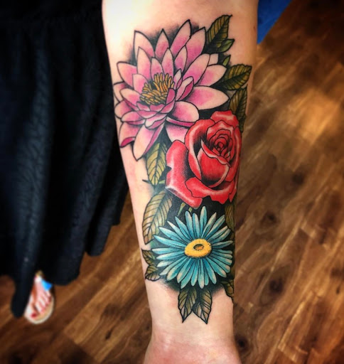 Explore family tree tattoo ideas with names, creative tattoo ideas in Lawrence, available at Standard Electric Tattooing