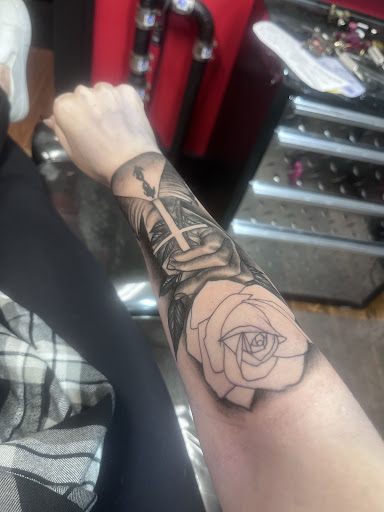 Explore female calf tattoo ideas, creative tattoo ideas in Council Bluffs, available at Black Squirrel Tattoo