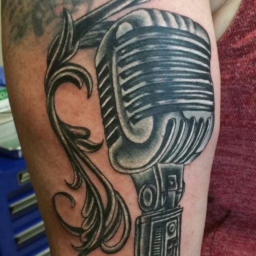 Explore cool hand tattoo ideas, creative tattoo ideas in Auburn, available at Derm FX Tattoo