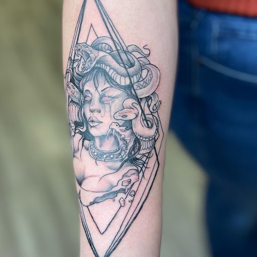 Find surrealism tattoo ideas for your next unique tattoo in Watford City at Soulful Ink Studios