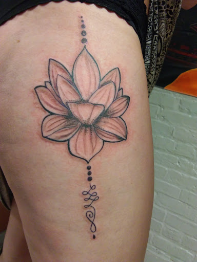 Explore skull tattoo ideas for men, creative tattoo ideas in Cumberland, available at Queen City Ink