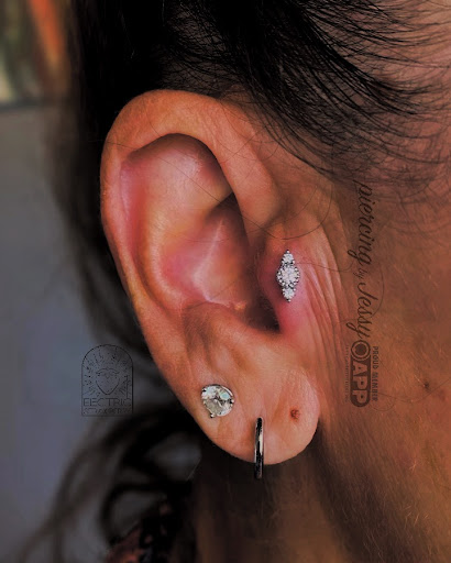 Explore iron tattoo ideas, creative tattoo ideas in Saint Paul, available at Electric Strawberry Piercing