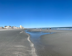 Garden City Pier beach'in fotoğrafı - rahatlamayı sevenler arasında popüler bir yer