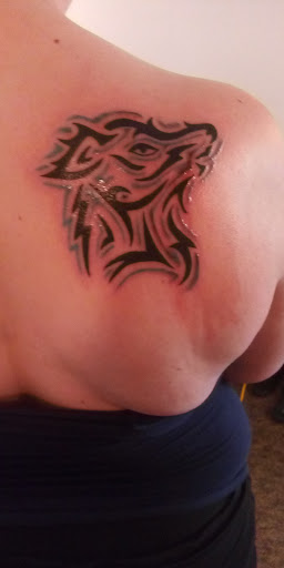 Explore forearm wolf tattoo ideas, creative tattoo ideas in Navasota, available at Big Mikes Tattoos