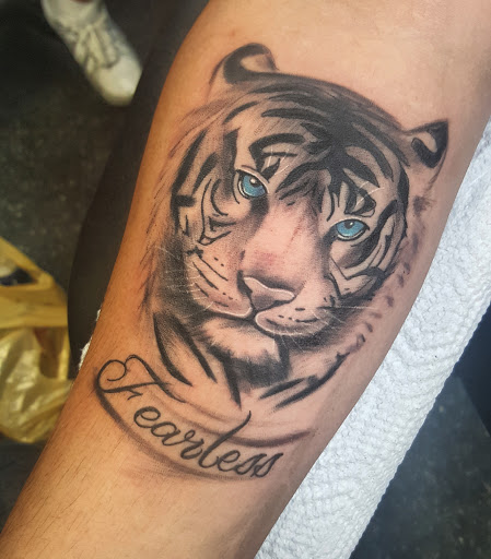 Tattoo Shop «Tan the Man Tattoo & Body», reviews and photos, 6871 S Gessner Rd, Houston, TX 77036, USA