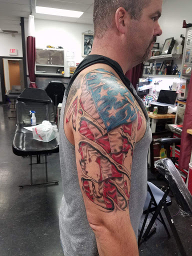 Explore nautical compass tattoo ideas, creative tattoo ideas in Hilliard, available at 22 Caliber Tattoo Mega Studio