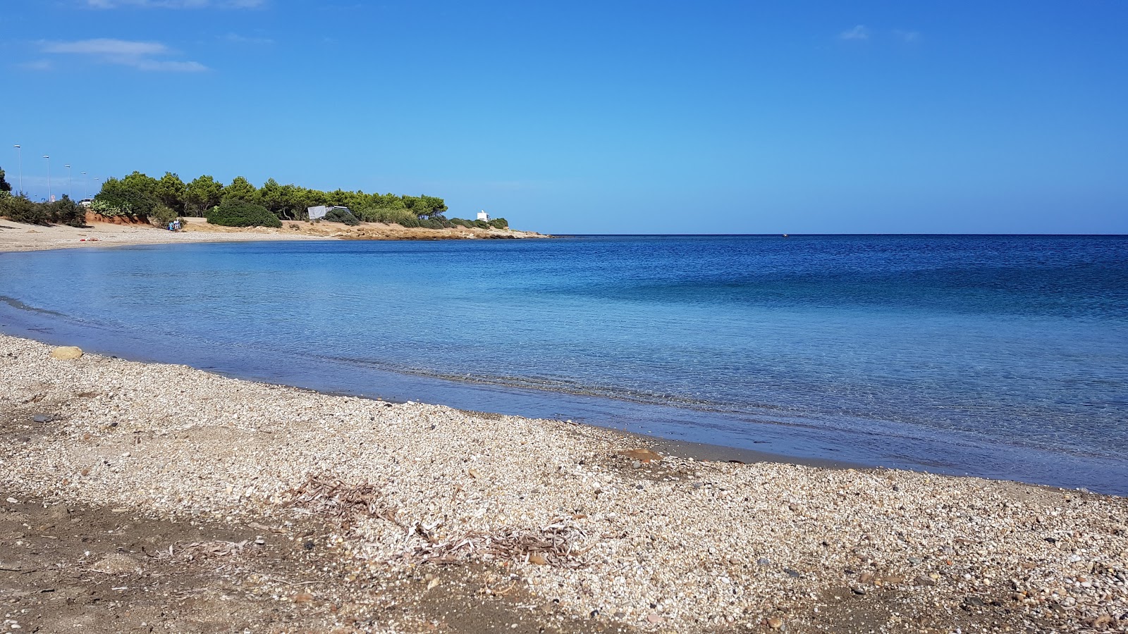 Foto de Spiaggia di Porto Corallino con playa recta