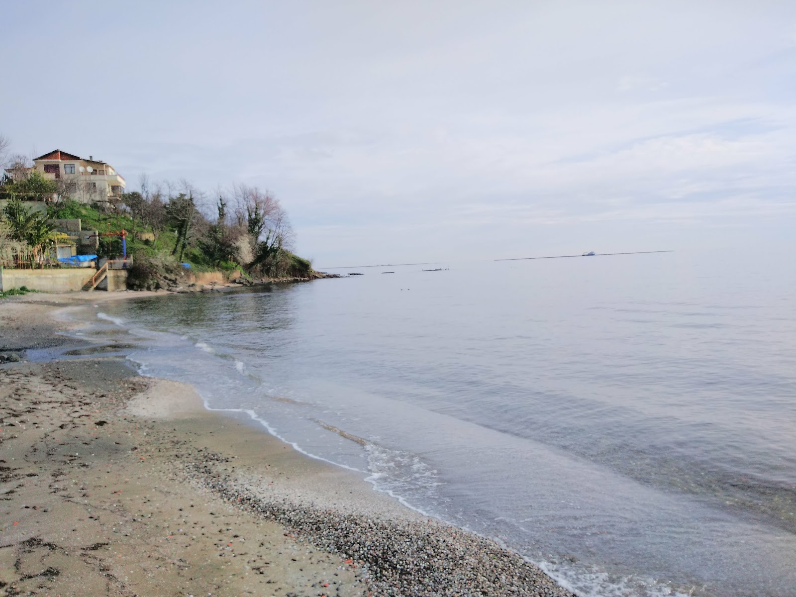 Foto di Deniz Kabugu Plaji con una superficie del acqua cristallina