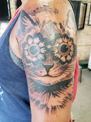 Explore three heart tattoo ideas, creative tattoo ideas in Houghton, available at Edge Tattoo Inc