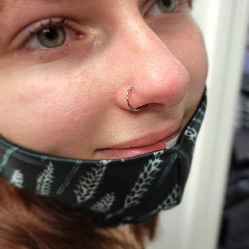 Explore black lab tattoo ideas, creative tattoo ideas in Sarasota, available at Z-Edge Tattoo and Body Piercing North Shop