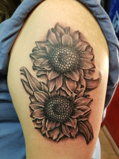 Explore 4 leaf clover tattoo ideas, creative tattoo ideas in Phenix City, available at Skin Traditions Tattoo Studio