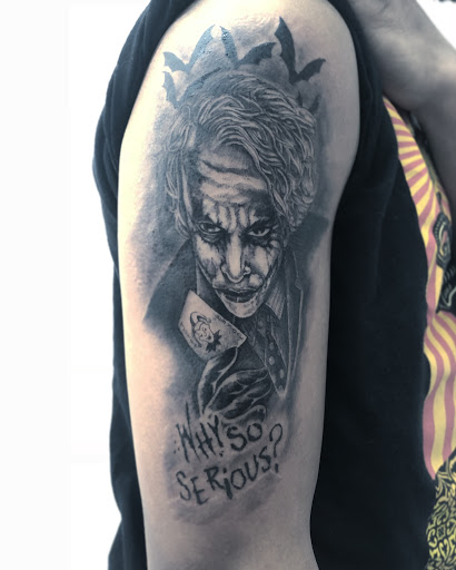 Explore roman numeral tattoo ideas for guys, creative tattoo ideas in Scarsdale, available at Damm Nice Tattoo & Body Art