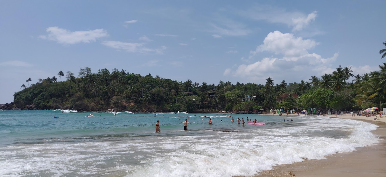 Photo of Dickwella Beach with turquoise pure water surface