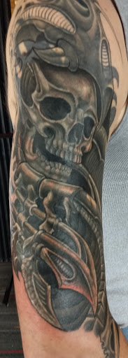 Explore side tattoo ideas for men, creative tattoo ideas in Richmond, available at Redwoods Wild Side Tattoo