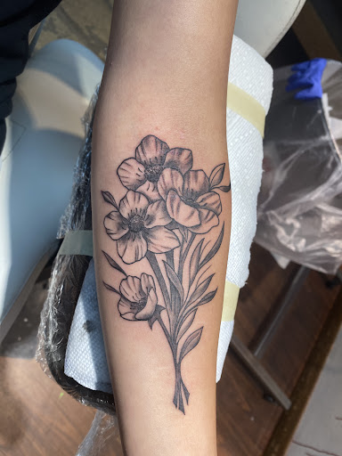 Find dc tattoo ideas for your next unique tattoo in Waterloo at Cedar Valley Tattoo & Piercing Studio