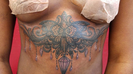 Explore headstone tattoo ideas, creative tattoo ideas in San Antonio, available at Nite Owl Tattoo Studio