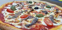 Plats et boissons du Livraison de pizzas Pizza Laurent - Stéphanie et Laurent Carbajales à Maraussan - n°1