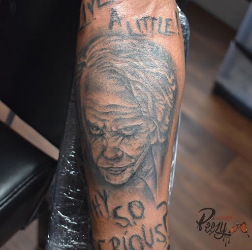 Explore mens shoulder tattoo ideas, creative tattoo ideas in Norcross, available at Ink Slangin Peezy