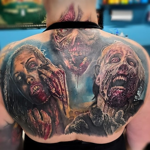 Explore c section tattoo ideas, creative tattoo ideas in Utica, available at Watchtower Tattoo Company