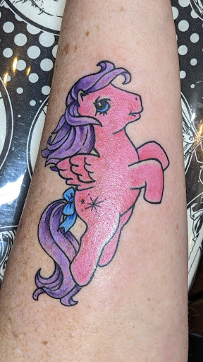 Explore hood neck tattoos ideas, creative tattoo ideas in Colorado Springs, available at El Dorado Tattoo Parlour and Social Club