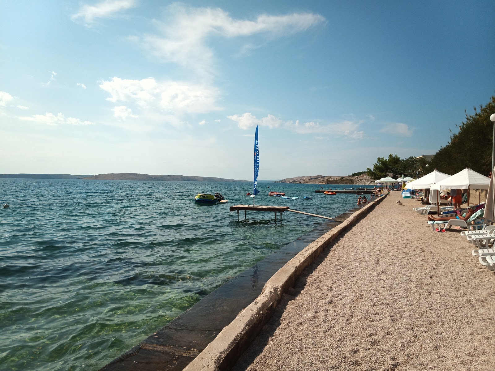 Foto av Miletici beach med turkos rent vatten yta