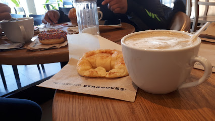 Starbucks Coffee [Tienda: Puerto Madero]