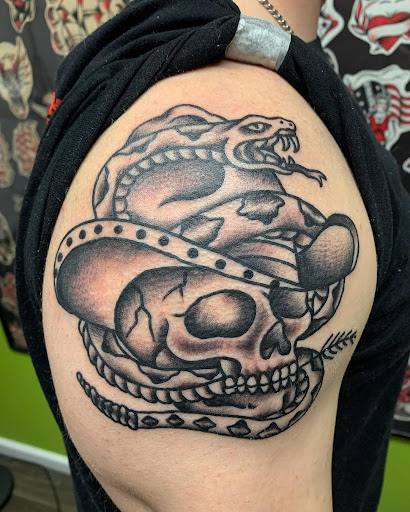 Explore wife name tattoo ideas for husband, creative tattoo ideas in Gloucester City, available at 12 oz. Studios Tattoos and Piercing Brooklawn