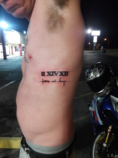 Tattoo Shop «Chicky Tattwo Tattoo Parlor», reviews and photos, 2001 W Main St, Leesburg, FL 34748, USA