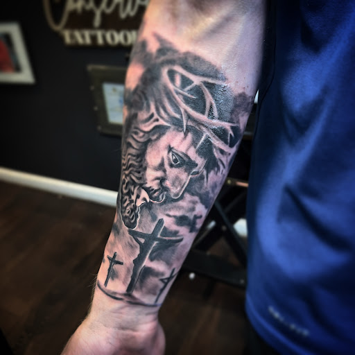 Explore dominican flag tattoo ideas, creative tattoo ideas in Medina, available at Greasers Ink