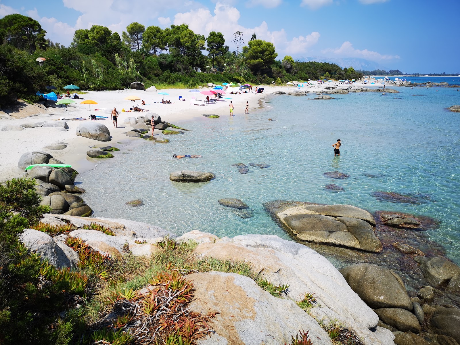 Foto di Spiaggia del Lido di Orri con una superficie del sabbia fine e luminosa