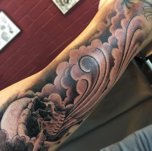 Explore unique sleeve tattoo ideas for females, creative tattoo ideas in San Diego, available at Sideshow Tattoo and Piercing