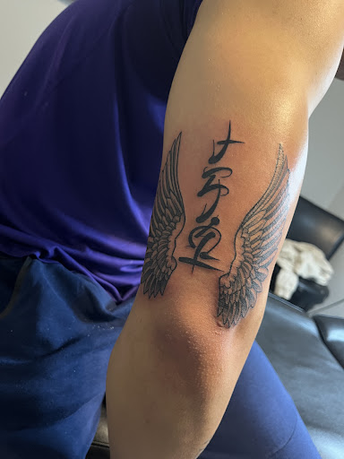 Explore magician tattoo ideas, creative tattoo ideas in Madison, available at Elevation Ink Tattoo Studio