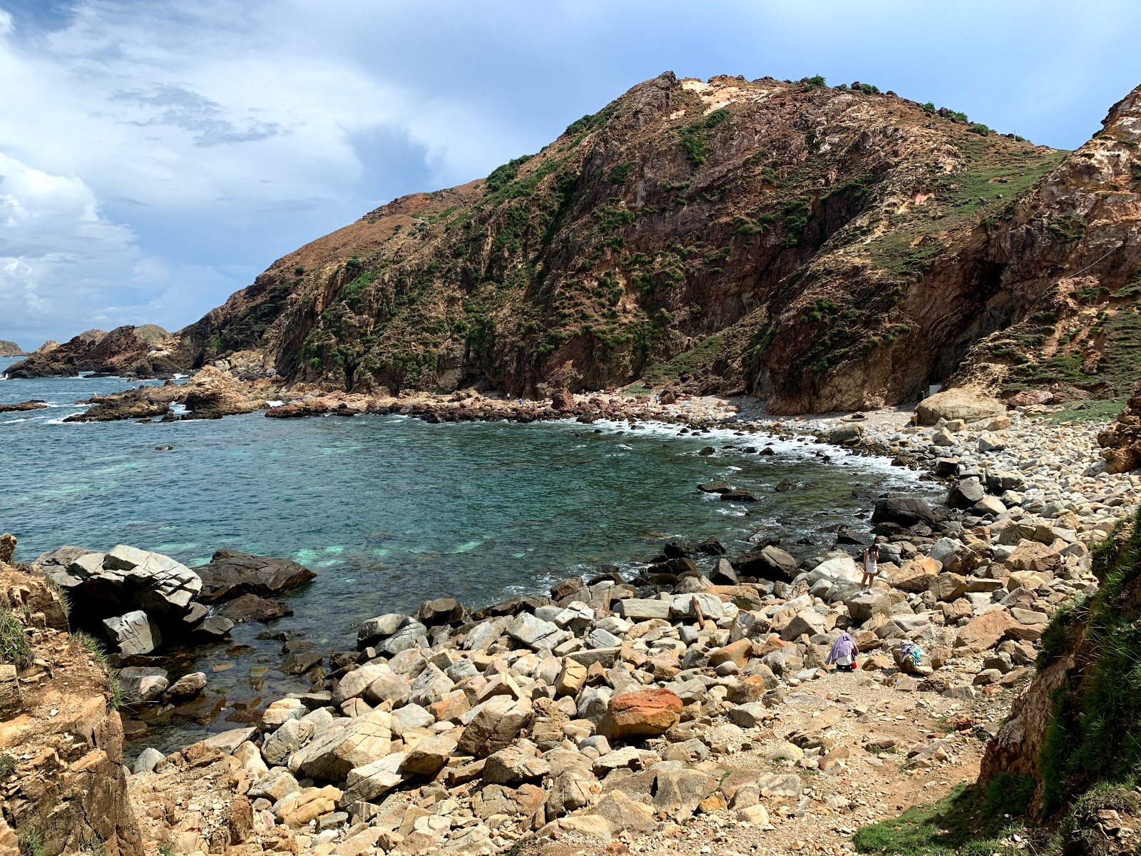 Eo Wind Beach'in fotoğrafı taşlar yüzey ile