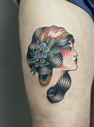 Explore snowboard tattoo ideas, creative tattoo ideas in North Windham, available at Vanaheim Tattoo