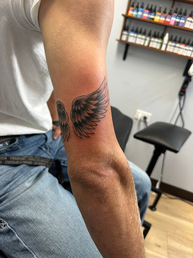 Explore hmong tattoo ideas, creative tattoo ideas in Whitehall, available at Beachside Tattoos & Smoke Shop