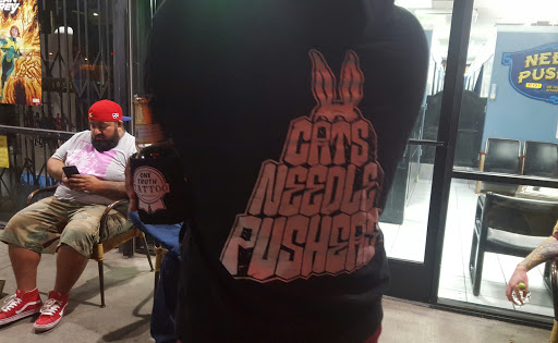 Explore love and war tattoo ideas, creative tattoo ideas in Van Nuys, available at Needle Pushers