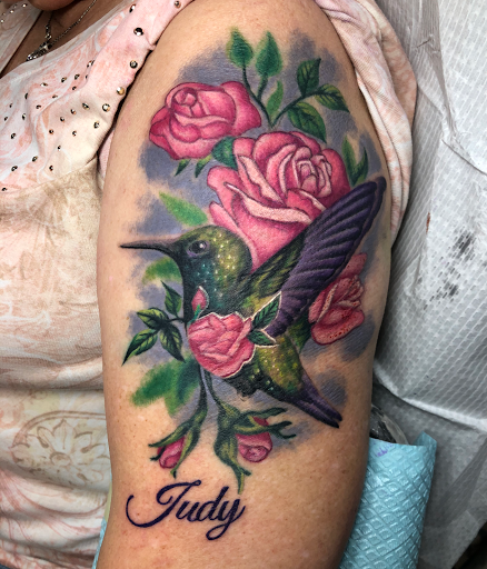 Explore small dog tattoos ideas, creative tattoo ideas in Jacksonville, available at Electric Legacy Tattoo