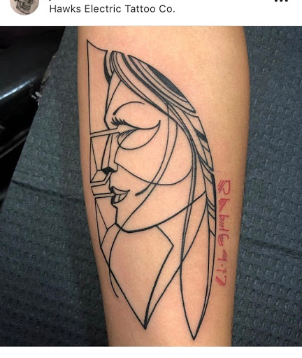 Explore men's behind the ear tattoo ideas, creative tattoo ideas in Tampa, available at HAWKS ELECTRIC TATTOOS