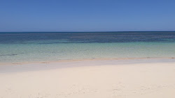 Foto von Playa El Portillo und die siedlung