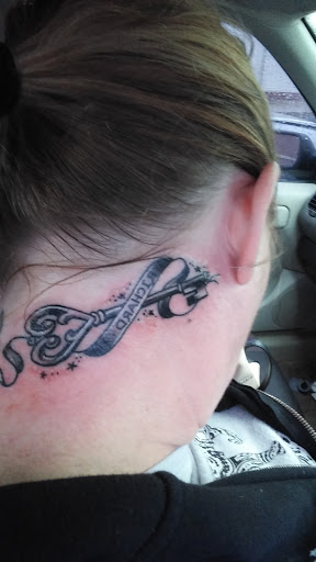 Explore dominican flag tattoo ideas, creative tattoo ideas in Indianapolis, available at Artistic Skin Design and Body Piercing