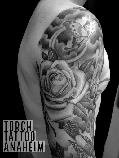 Explore snake sleeve tattoo ideas, creative tattoo ideas in Anaheim, available at Torch Tattoo