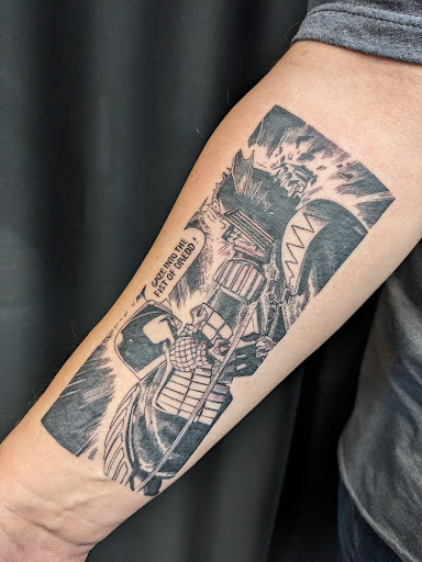 Explore cool guitar tattoo ideas, creative tattoo ideas in Matthews, available at Divine Arts Tattoo Company