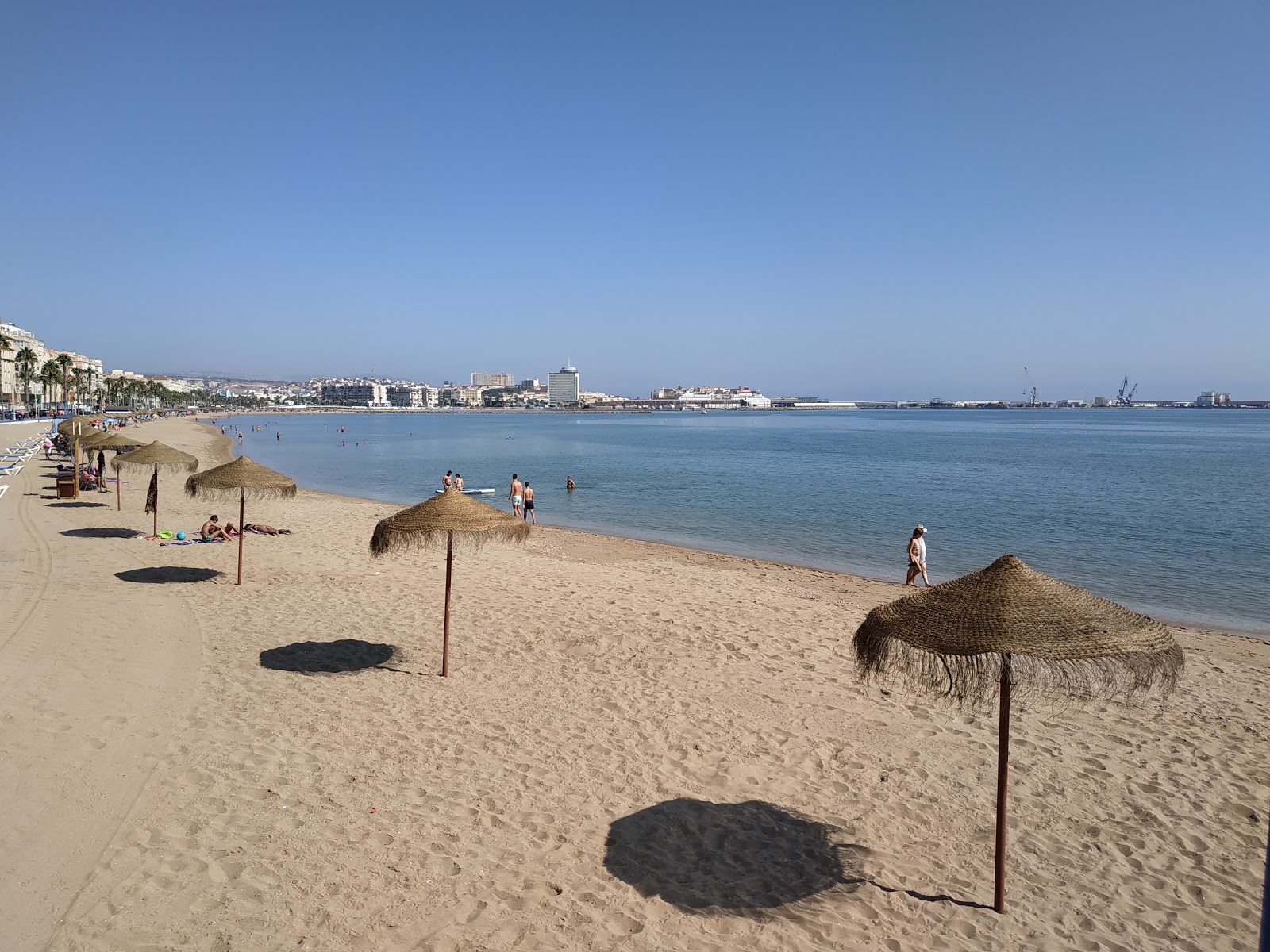 Foto van Playa de los Carabos met helder fijn zand oppervlakte