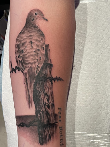 Explore wolf tattoo ideas for men, creative tattoo ideas in Weatherford, available at Weatherford Tattoo Co.